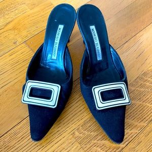 Manolo Blahnik black mules with cream buckle